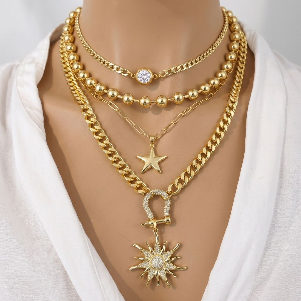 "Sól Rises" - Gold Steel Layered Chunky Chain Sun Star Pendant Necklace Set