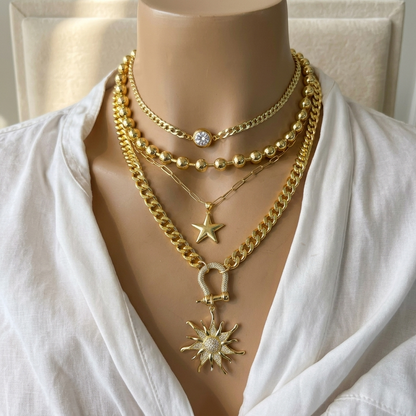 "Sól Rises" - Gold Steel Layered Chunky Chain Sun Star Pendant Necklace Set