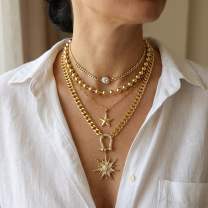 "Sól Rises" - Gold Steel Layered Chunky Chain Sun Star Pendant Necklace Set
