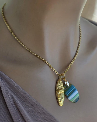 Upcycled Surfboard Resin Pendant with Gold Surfer Charm Necklace – Eco Friendly Ocean Jewelry