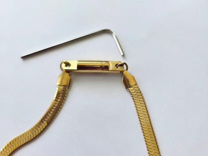 Shield Maiden™ Signature Lock & Key Clasp, a proprietary closure forged for strength, trust, and intention.