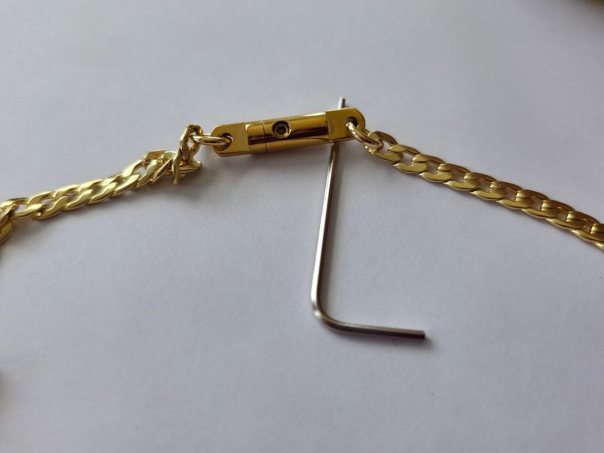 Shield Maiden™ Signature Lock & Key Clasp, a proprietary closure forged for strength, trust, and intention.