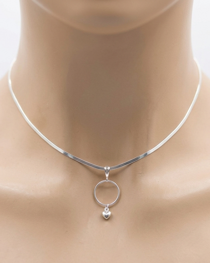 Silver necklace with a pendant on a mannequin neck